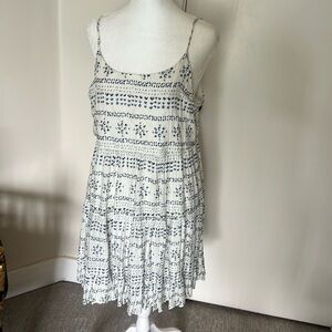 Cute blue and white sundress with adjustable straps.  Size L